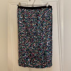 Mutli-color sequin skirt with elastic waistband.